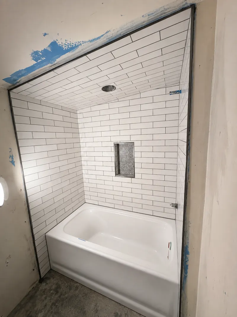 Subway tile tub surround, Bathroom Renovation 6 by Altitude Renovation